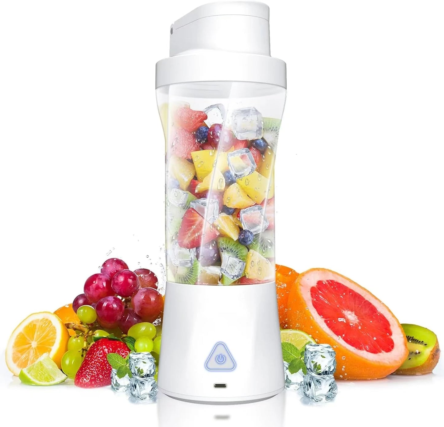 White portable blender filled with fruits and ice cubes, surrounded by additional fruits on a white background